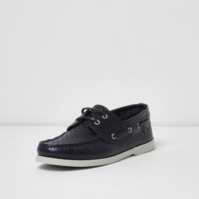 Navy blue leather woven boat shoes